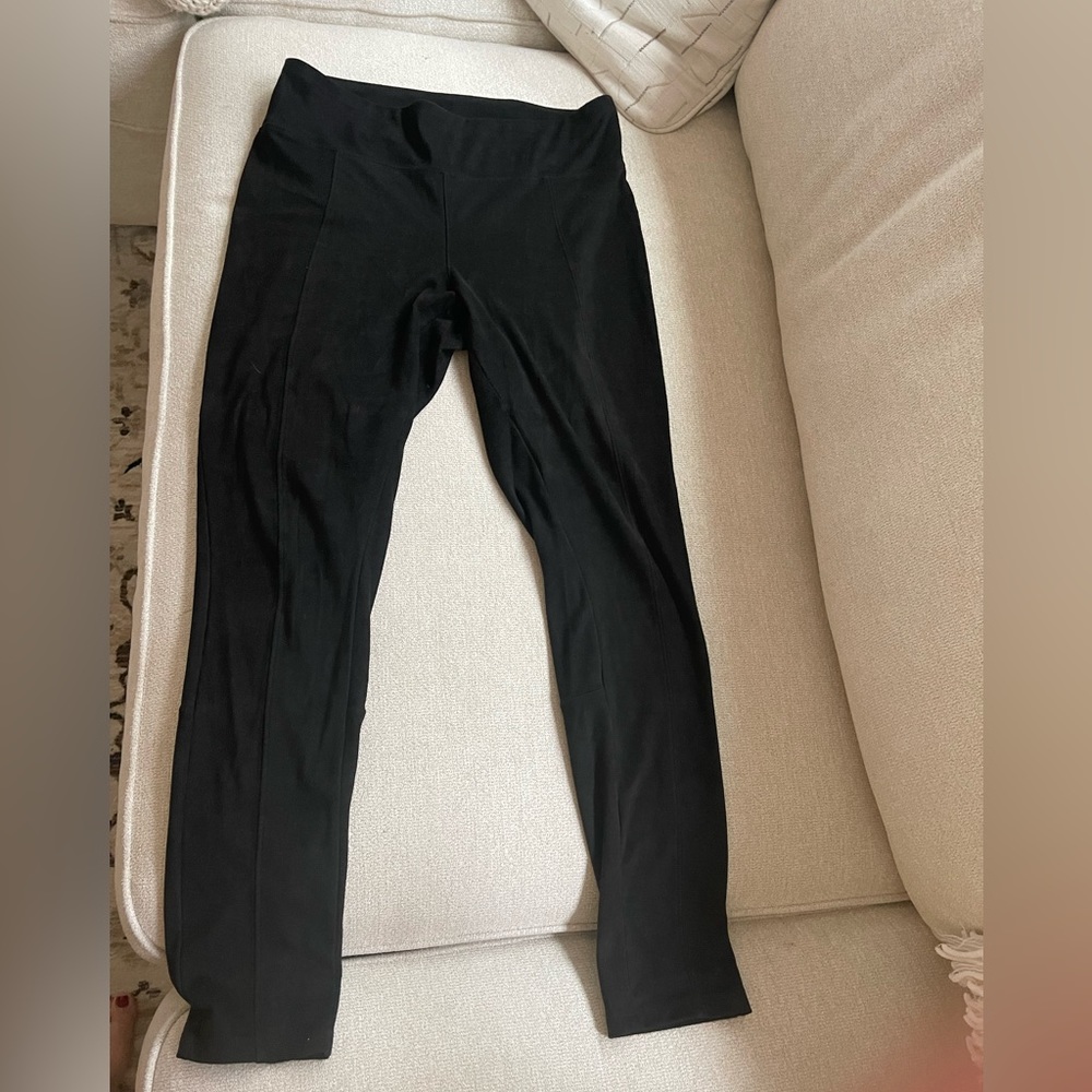 Express Black size medium high waisted faux suede leggings. Never worn.